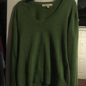 Green sweater with buttons on sleeves